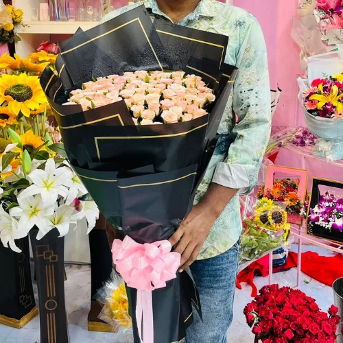 100 Shade Pink Rose Round Bouquet with Black Wrap