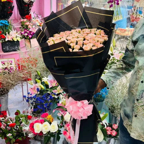 100 Shade Pink Rose Round Bouquet with Black Wrap