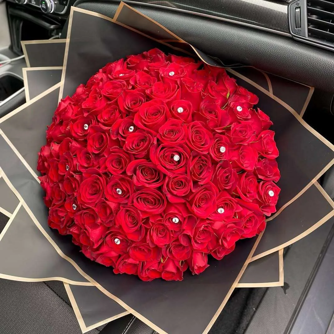 100 Red Roses with Crystal Accents in Black & Gold Wrap