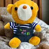 Charming Yellow Teddy in Denim Outfit – photo 1